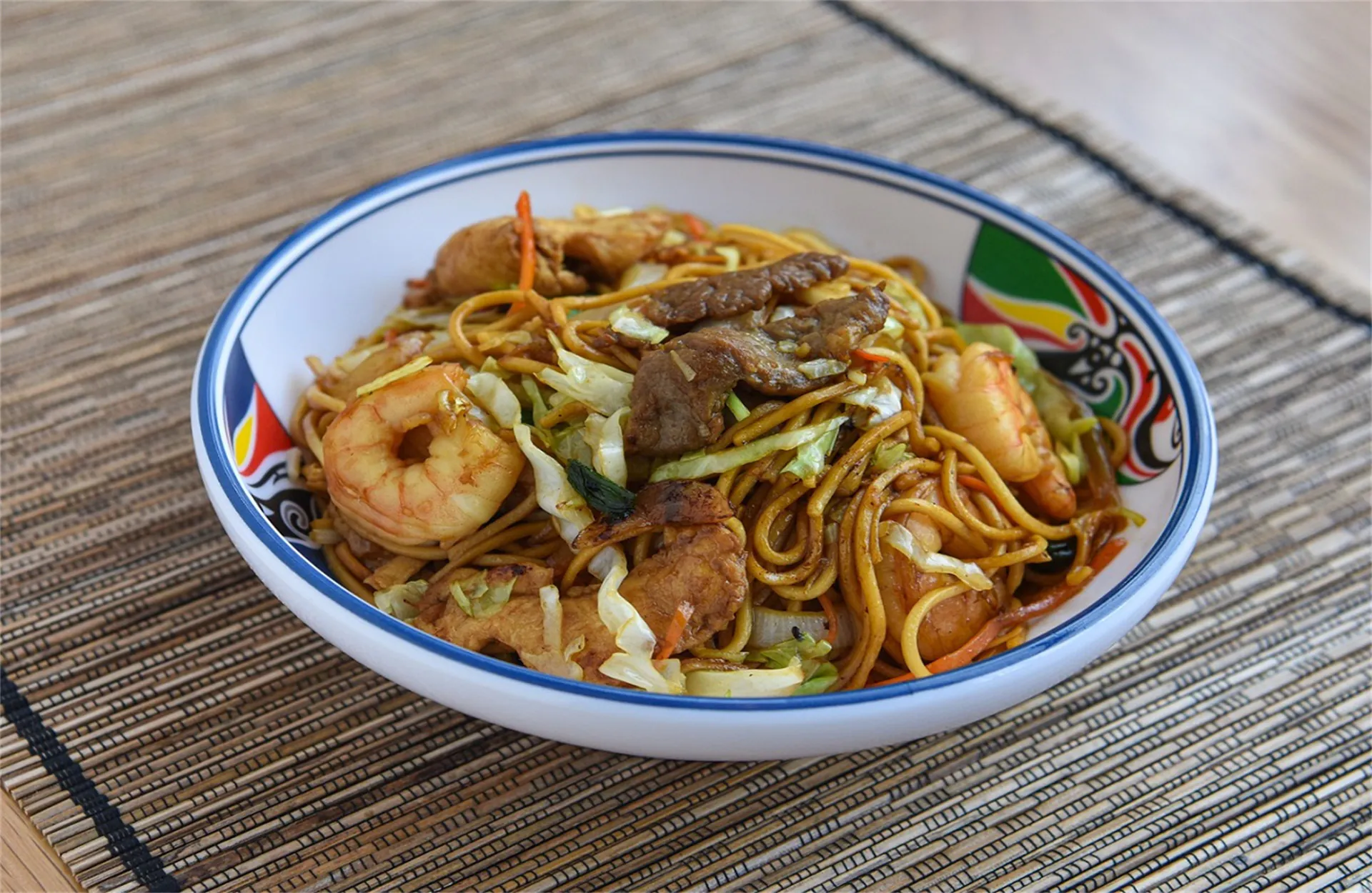 Stir-fried noodles with shrimp, beef, chicken and veggies at Mee Shane Restaurant, a Chinese Restaurant in Ashton.